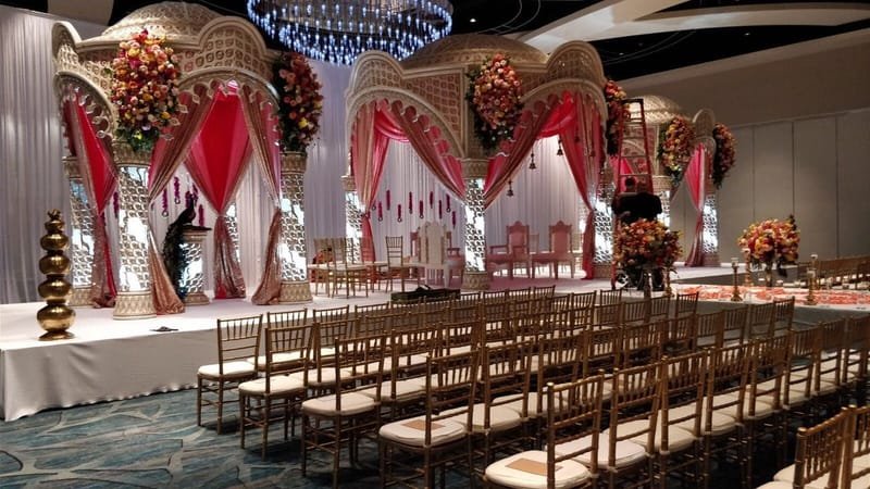 Elephant carved mandap: Hand-carved wood · ballroom